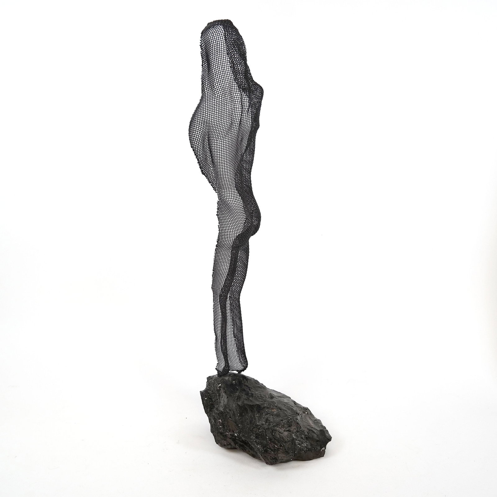 Randy COOPER: Nude - Wire Mesh Sculpture: "Shadow" sculpture of a nude female torso and legs, made of hand-formed wire mesh, by Randy Cooper (American, b. 1942), on a natural stone base. [Overall: 25 1/2" H x 6 1/2" W x 9" D]. In good conditi