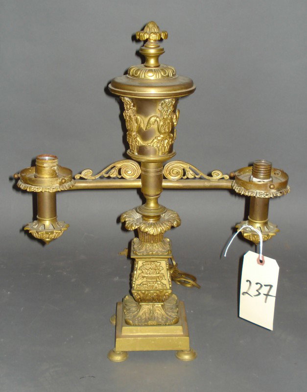 Bronze Dore Argon Lamp: Bronze Dore Argon Lamp, French two arm argon lamp, relief design. Missing one leg. 19c. Fitted For Electrical 21" x 16"