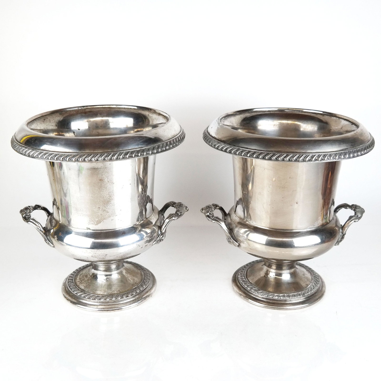 Pair of Silver Plate Wine Coolers: Pair of Bernard Rice's Sons silver plate "Apollo" wine coolers. [11" H x 10" Diam. (top)]. In good condition.