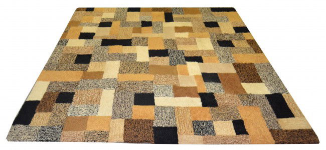 Mid Century Modern Edward Fields Rug: Hand made area rug having a patchwork design, signed Edward Fields. 78" x 91"