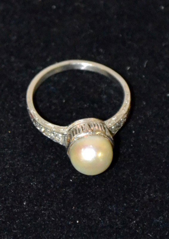 Pearl & White Gold Ring: A Solitaire Set in White Gold w/ Diamond Chips