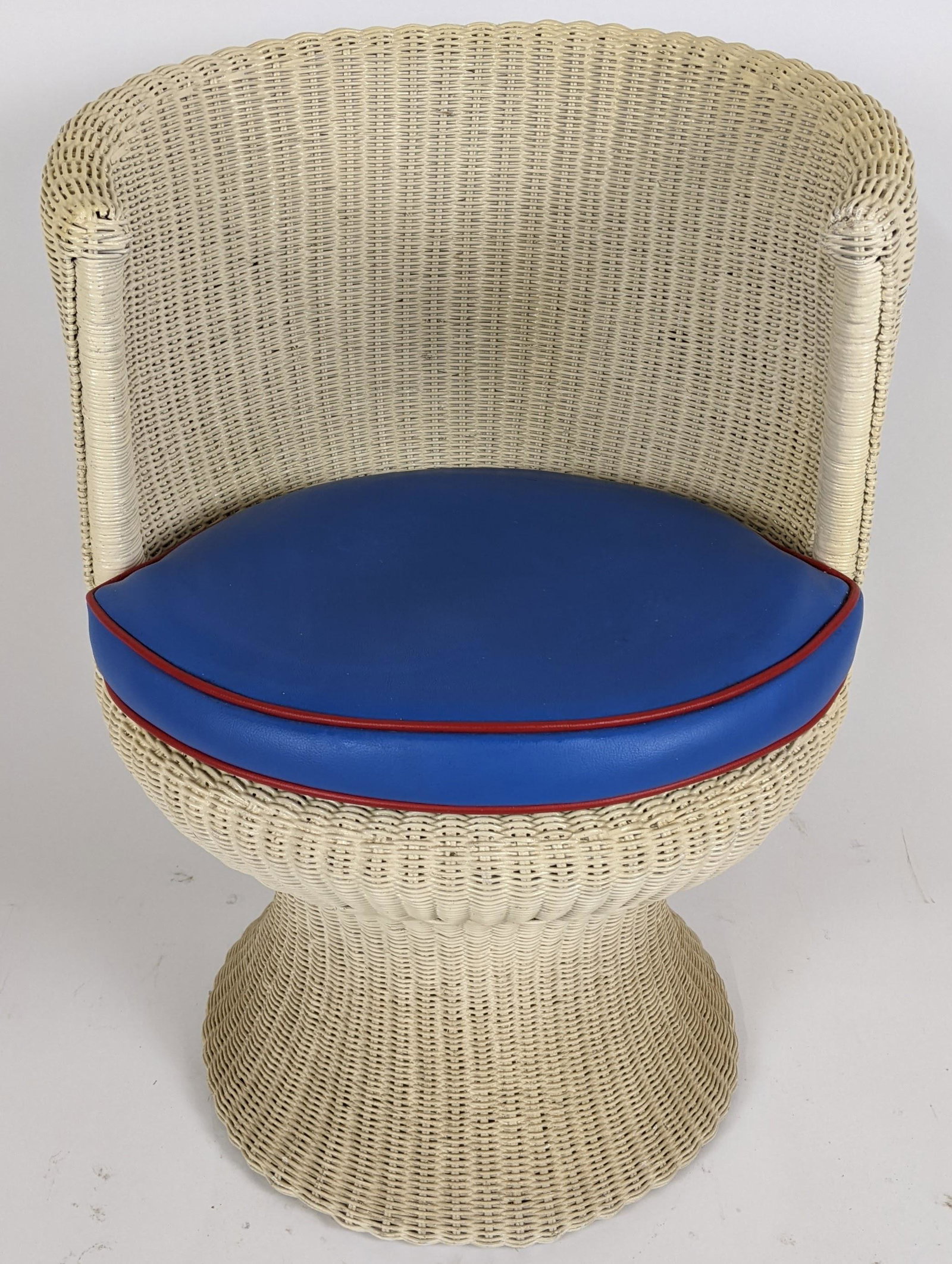 Wicker Barrel Chair: Late 20th century wicker barrel chair. [30" H x 21" W]. In fair condition.