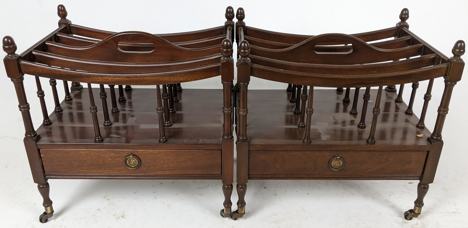 Pair of Mahogany One-Drawer Canterburys: air of 20th century English-style mahogany Canterbury magazine racks. [19" H x 19" W x 13" D]. In good condition.
