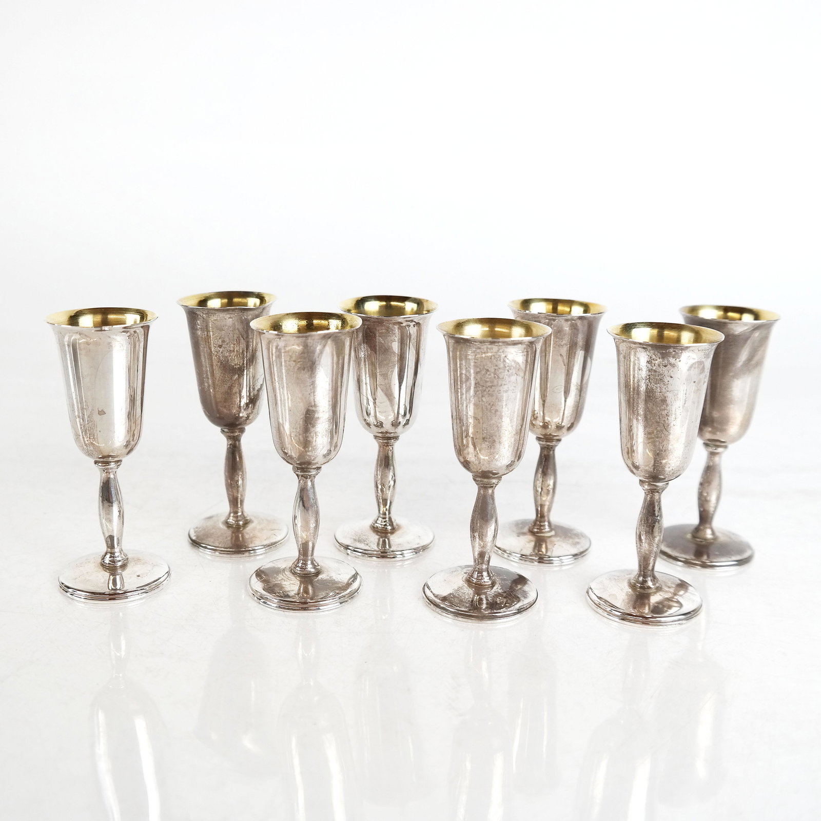 Set 8 Cartier Sterling Silver Port Stems: Set of 8 Cartier sterling silver port stems. 6 ozt. [3 1/2" H]. In good condition.