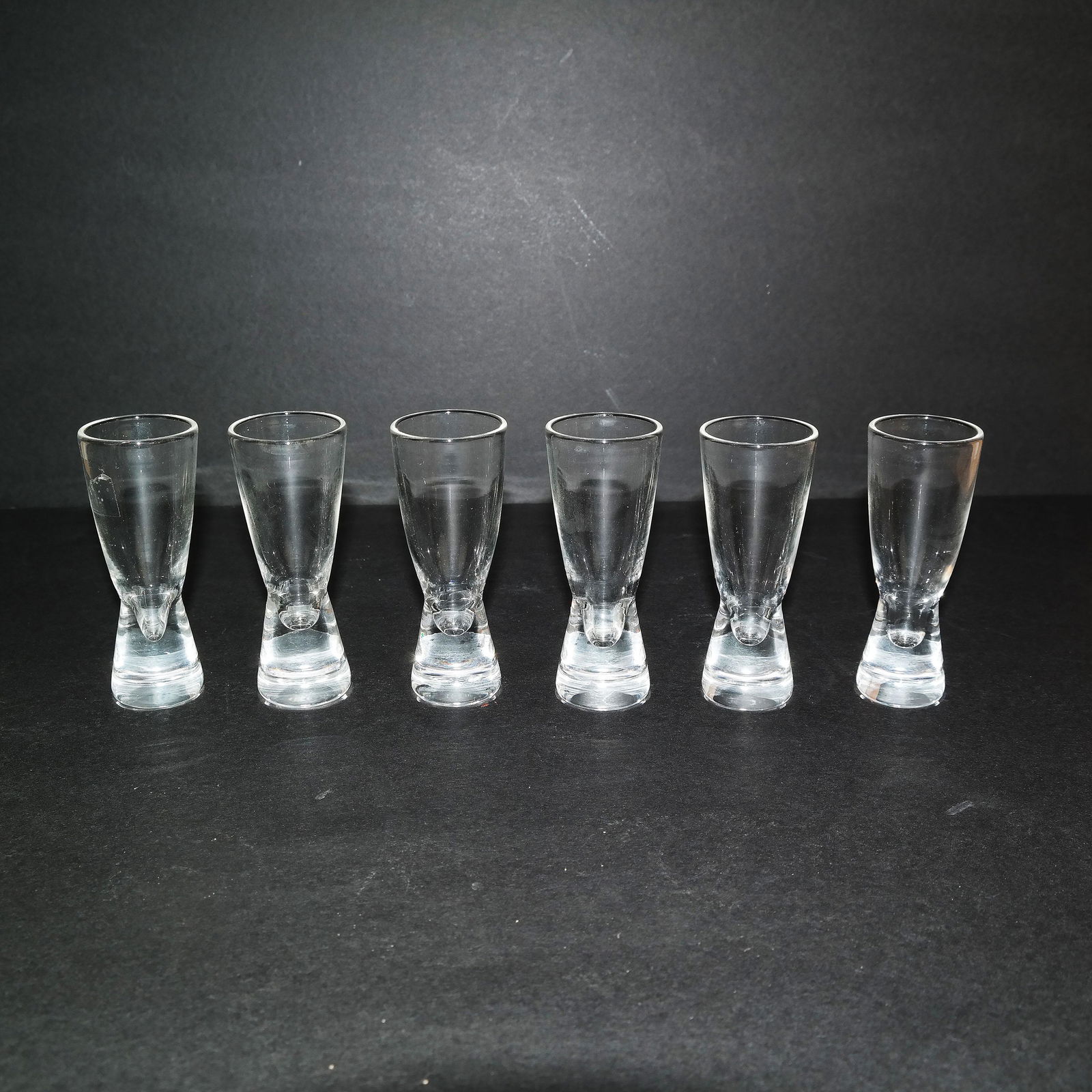 Set of Six Steuben Cordials: Set of six Steuben cordials. [4" H]. In good condition.