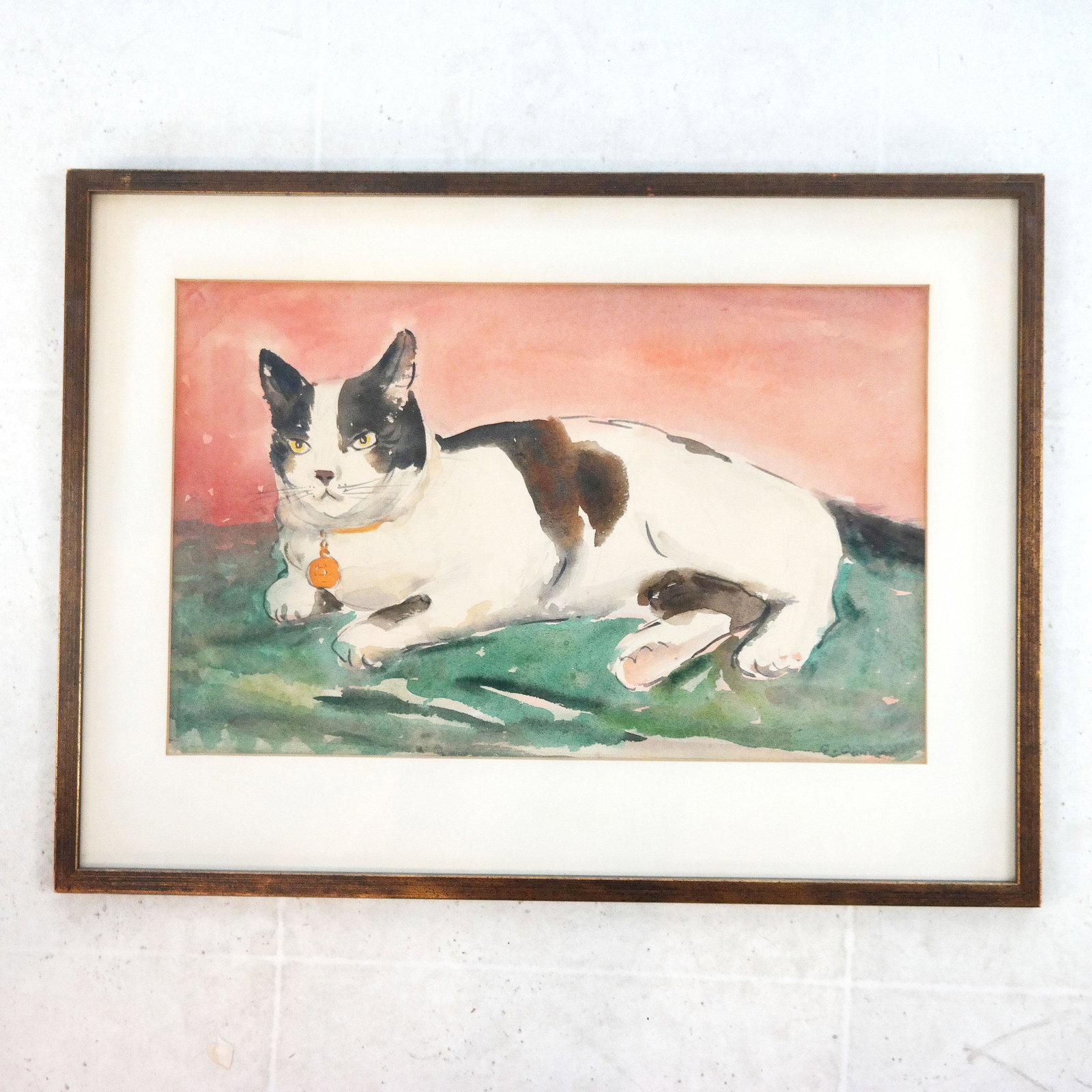 Framed Watercolor of a Cat: Framed watercolor on paper painting of a cat, illegibly signed lower right. [Art: 10" H x 16" W; Frame: 15 1/2" H x 20 1/2" W].
