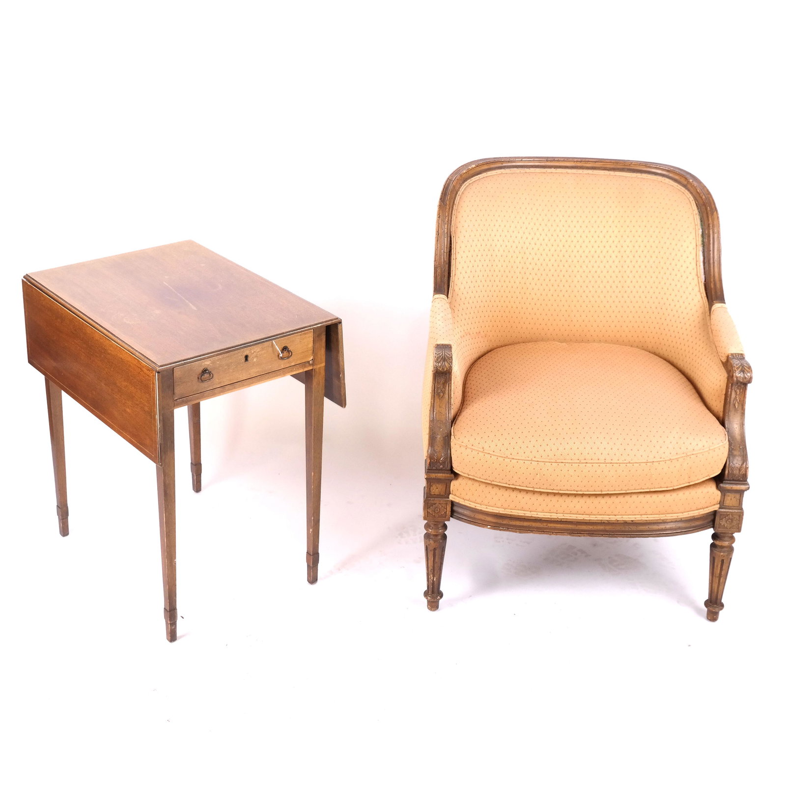 French-Style Chair & Pembroke Table: A Louis XVI-style upholstered bergere and an English-style inlaid Pembroke table. Chair: 36" H x 29" W x 32" D; Table: 28" H x 19" W x 26" D (36" open)]. In good condition.