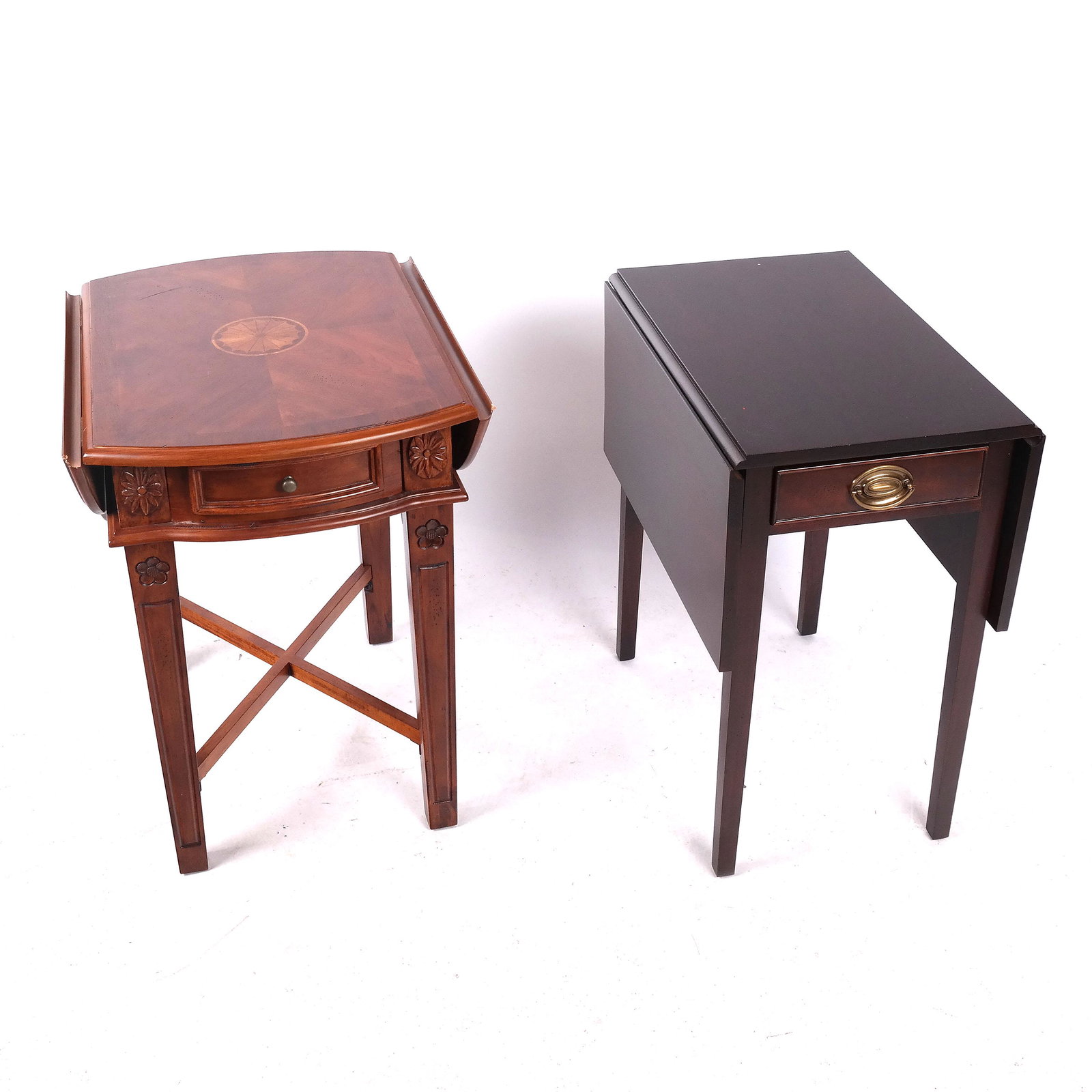 Two Pembroke Tables: Two Pembroke tables, one rounded with cross-banded top, and one squared. [Largest: 26" H x 34" W (open) x 25" D]. In good condition.