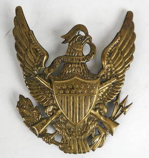 Colonial Bronze Eagle: Bronze eagle, having a coat-of-arms with stars, originally mounted as an applique. [4 3/4" H x 3 3/4" W].