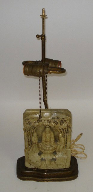 Chinese Lamp, Soapstone: Two people alongside a statue of buddha. Measurements: 12"