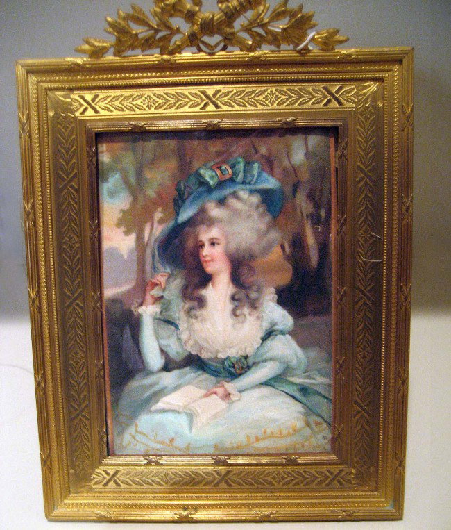 Ivory Mini Painting Signed A.B.: Depicting a woman in a blue bonnet in a landscape set in a finely incised bronze dore frame. Measurements: 4" x 5" H, 8.5" x 6" w/frame