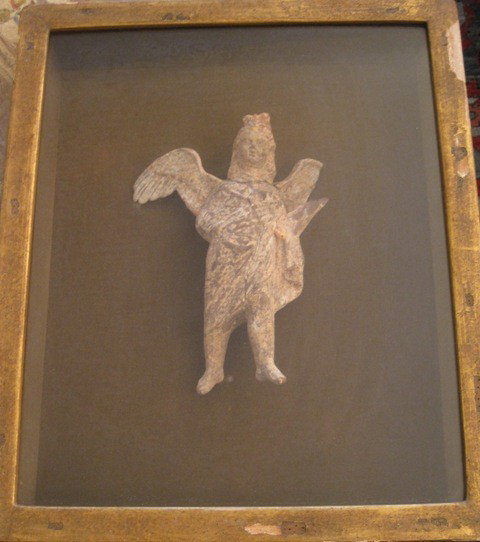 Elie Nadelman Terracotta (Attributed to) Figure in: Terracotta figure of a Nike in a shadow box. Measurements: