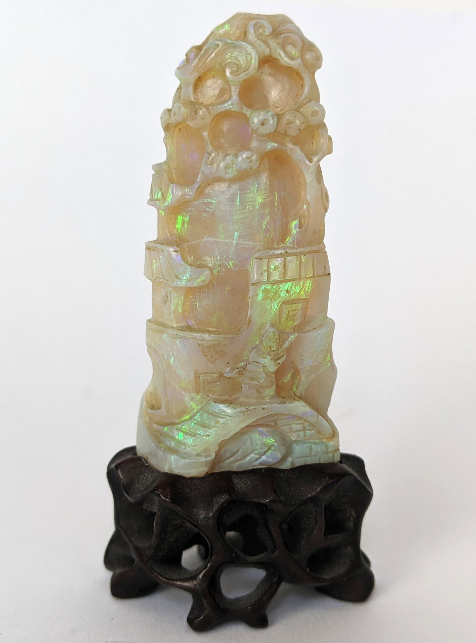 Chinese Fine Opal Seal: Antique Chinese fine opal seal, on stand. From the Estate of June Hirsch Jones. [2 1/4" H x 1" x 1/2" D]. In good condition.