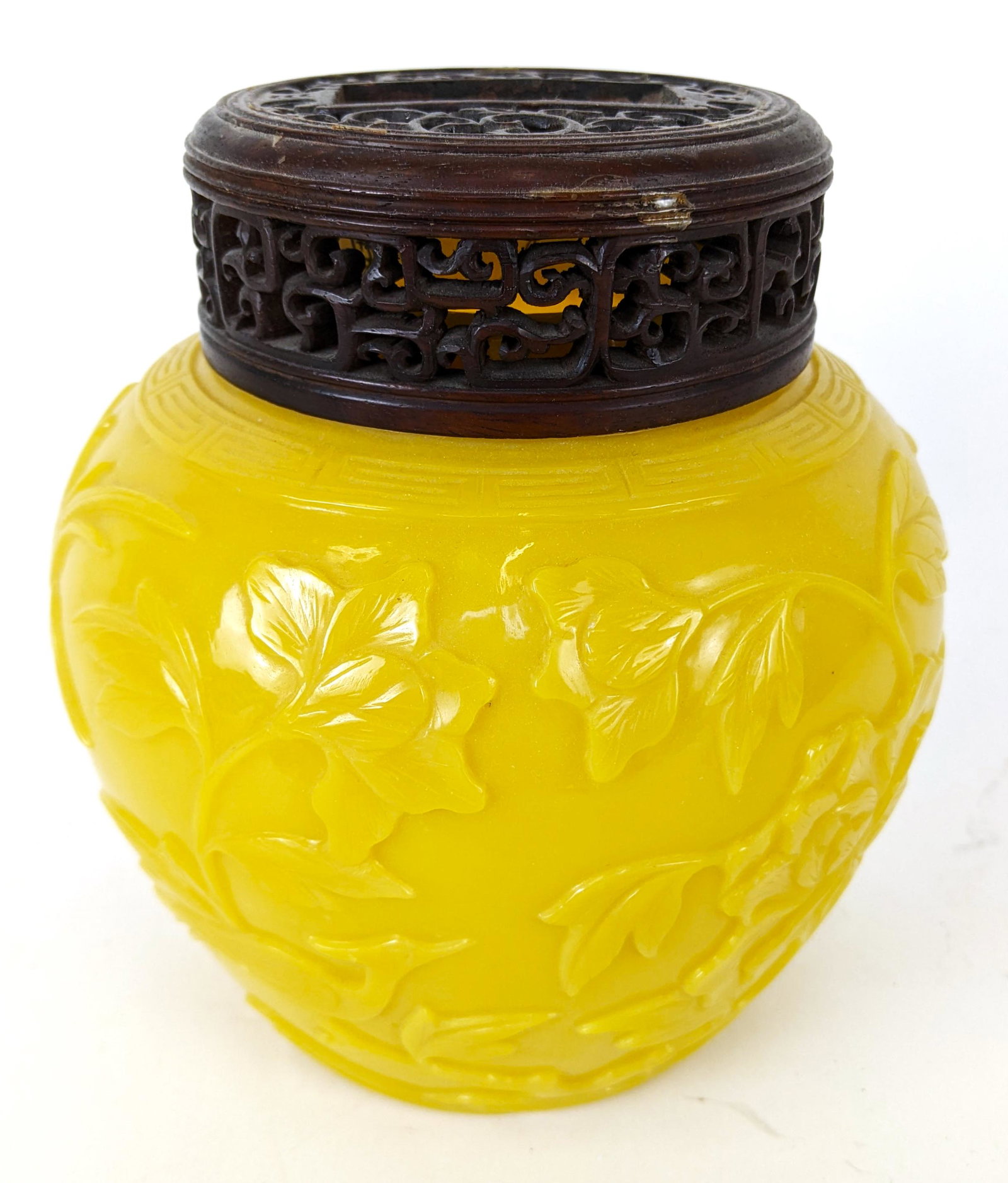 19th Century Yellow Peking Glass Ginger Jar: 19th century yellow Peking glass ginger jar, decorated with birds and flowers, with carved wood top. Purchased at Hartman Galleries; comes with original invoice. From the Estate of June Hirsch Jones. 