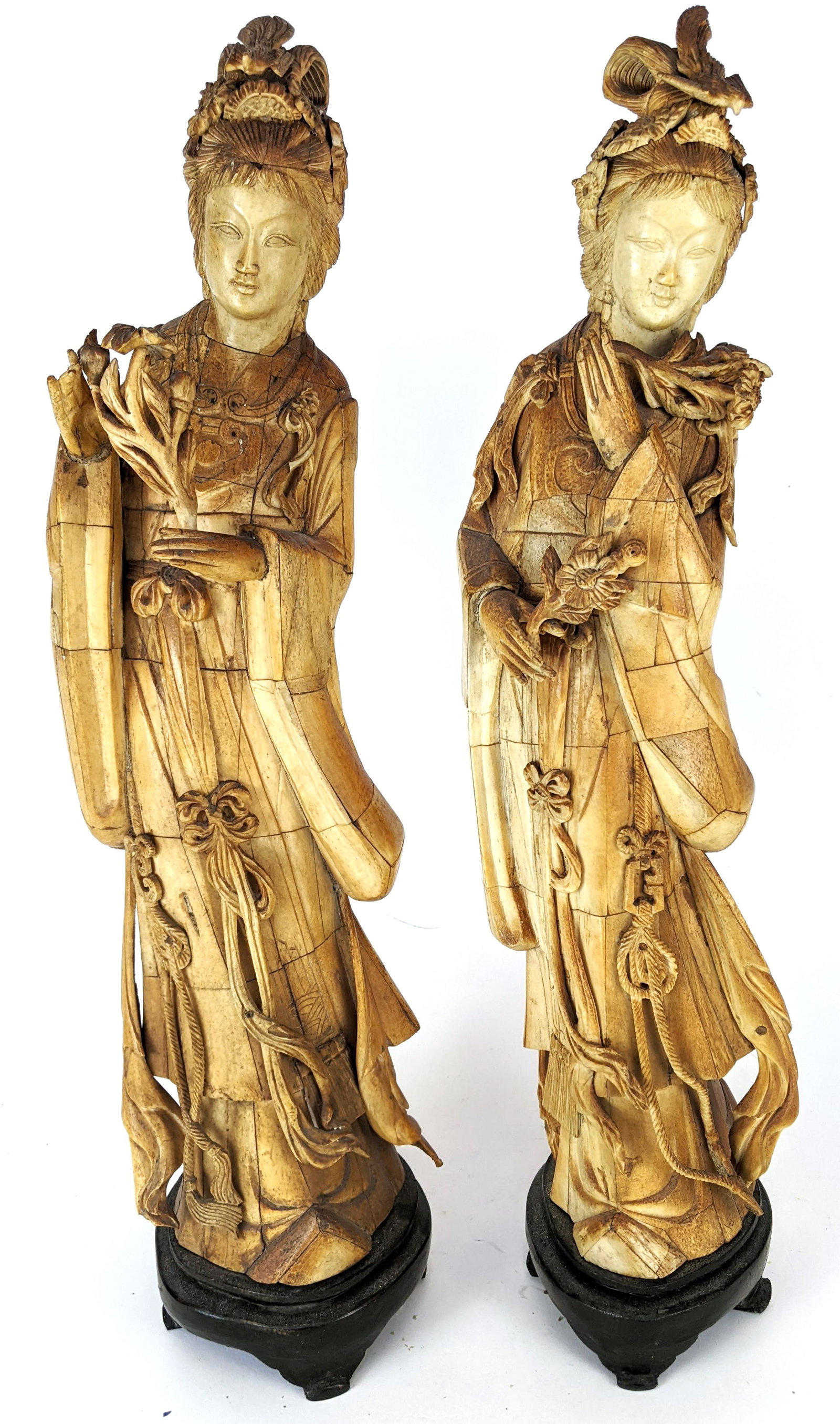 Pair of Bone Guan Yin Figures on Stands: Late 18th-early 19th century bone Guan Yin statues on stands. From the Estate of June Hirsch Jones. [23" H x 5" W x 5" D]. In good condition.