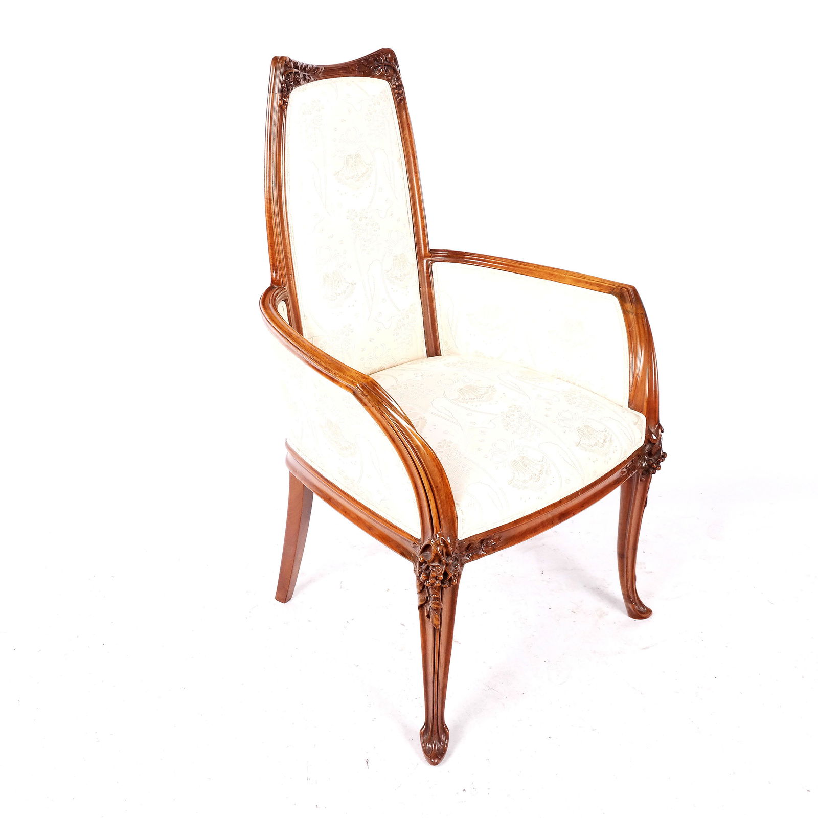 Art Nouveau Early 20th Century Armchair: Art Nouveau early-20th century fruitwood armchairs, with elaborate grapevine carved ears and leg fronts, in the Majorelle manner. Upholstered in and out. Provenance: Estate of Florence and Herbert Irv