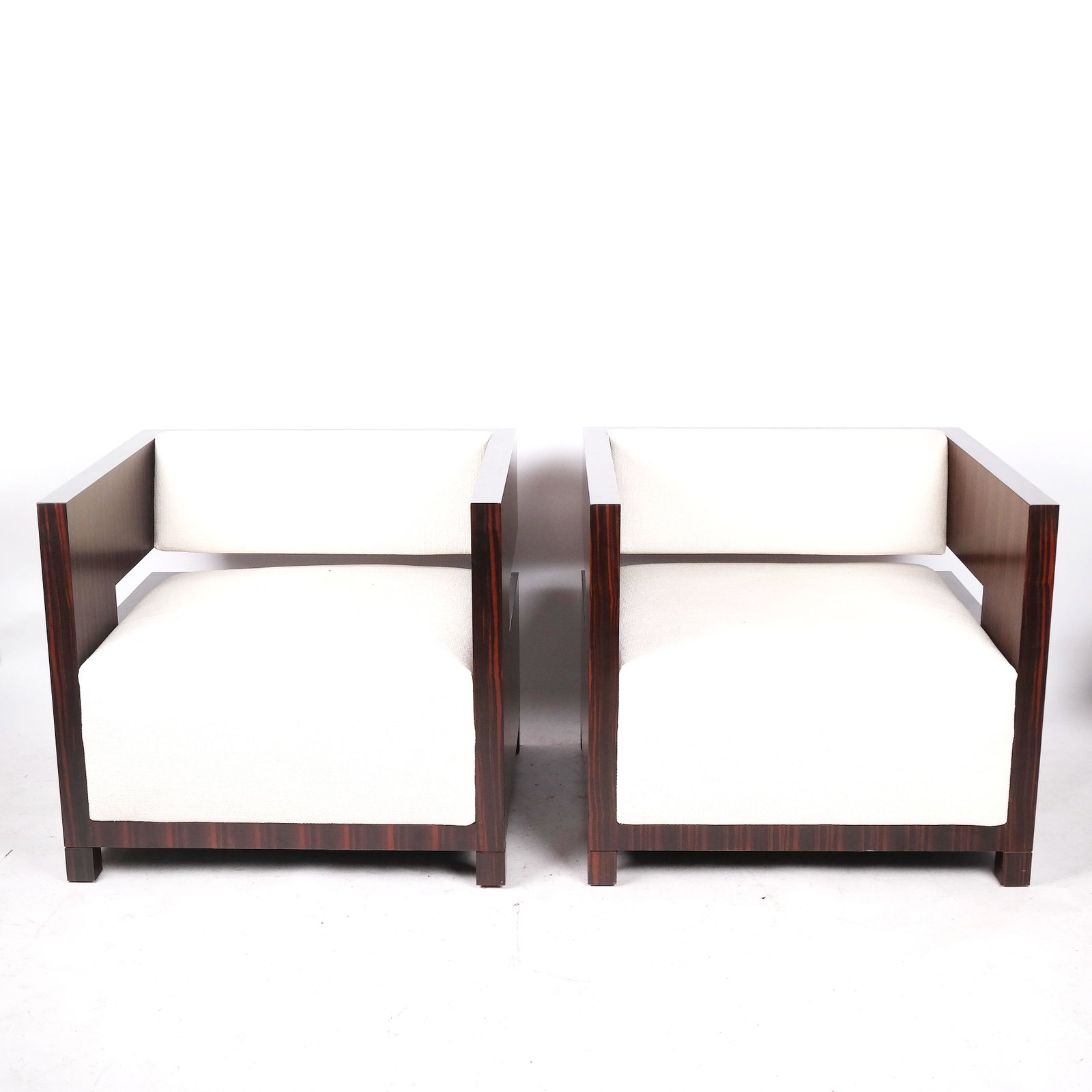Pair of Mid-Century Modern-Style Cubed Club Chairs: Pair of mid-century modern-style dark wood veneered, open architectural-style cubed chairs with light fabric upholstery. From the Estate of June Hirsch Jones. [29" H x 33" W x 30" D]. In good conditio