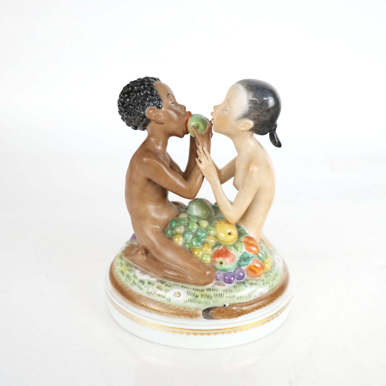 Danish Porcelain Group: Danish porcelain group, Adam and Eve as children. Provenance: Estate of Florence and Herbert Irving. [6" H x 4" Diam. oval].