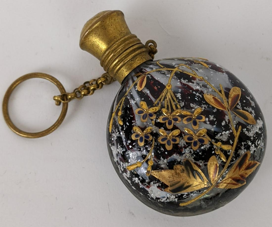 Antique Chinese Snuff Bottle: Antique Chinese snuff bottle, with floral applique. Provenance: Estate of Florence and Herbert Irving.