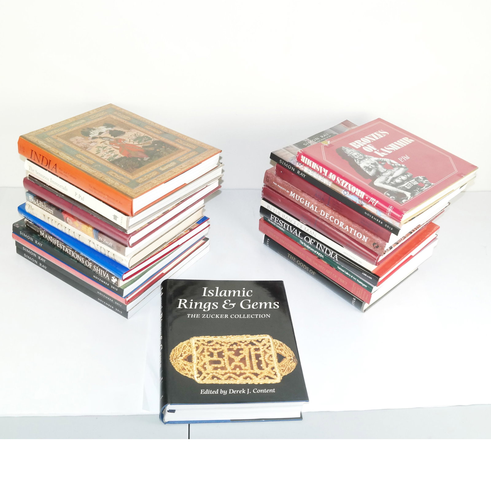 Collection of 24 Books on India: Collection of 24 books on India, including Mughal, Bronzes of Kashmir, Immortals, Simon Ray catalogs, Tibet, etc. Provenance: From the Library of Florence and Herbert Irving.