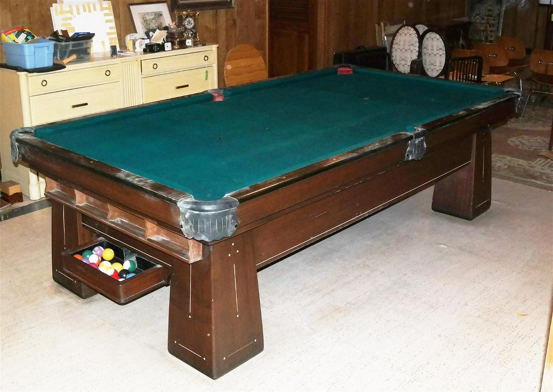 Billiard Table and Accessories: Billiards table having 3/4" thick slate top, brass inlay decoration, leather covers by pockets, ball return system. No maker information. Bears a brass plaque with initials "HI". Accessories include c