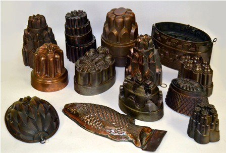 Copper Bake Moulds: Group of twenty one assorted copper bake moulds for pies, cake, etc. (Including one fish mold.) 1.5" to 8.5" H x 4" - 10" Dia