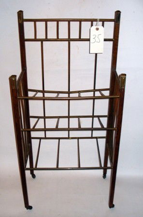 Brass and Wood Magazine Stand: Oak and brass three tier stand on coasters. 36.75" H x 11.25" D x 17.5" L