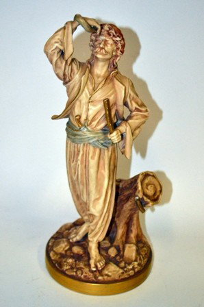 Royal Worcester Figure: A figure of a man, signed Hadley. Possibly part of something, missing righ hand. Good condition. 13.5" H