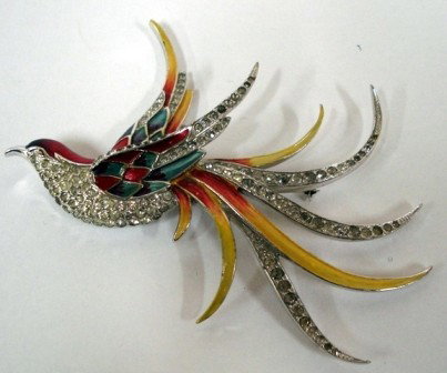 Marcel Boucher, Brooch: An enameled metal bird form pin Good condition