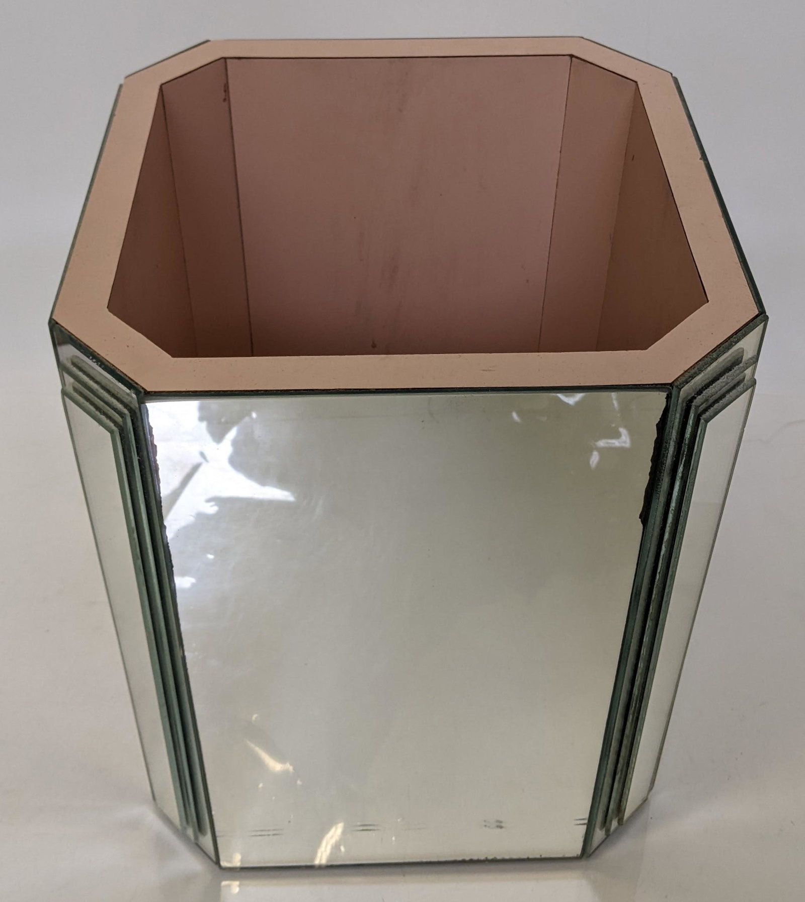 Mid-Century Modern Mirrored Planter: Mid-century modern mirrored planter with pink interior. From the Estate of June Hirsch Jones. [13" H x 10" W x 10" D]. In good condition.