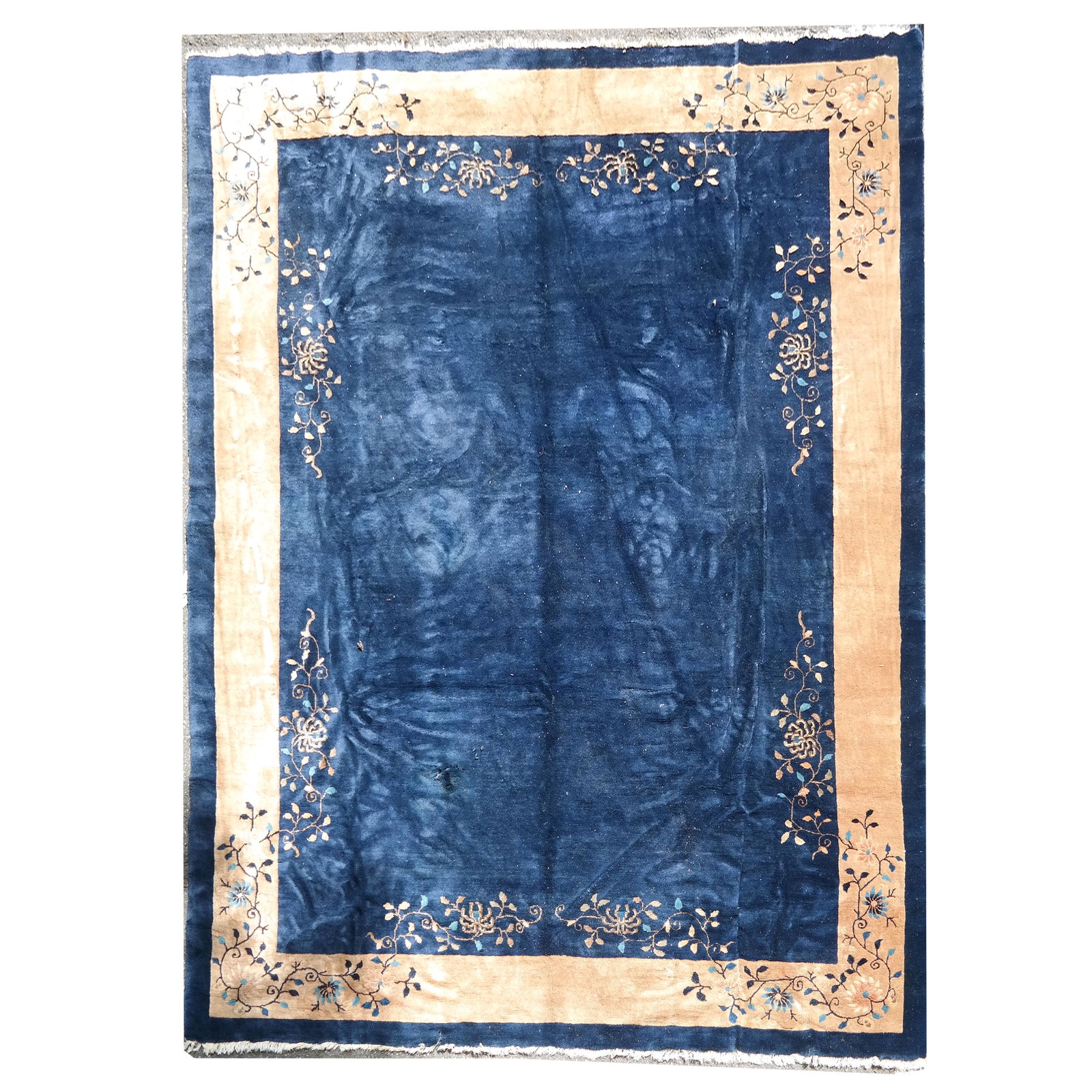 Chinese Peking Carpet: Navy blue and cream colored Peking rug, circa 1900. [9' 1" x 11' 8"]. Some areas with rot that needs restoration.
