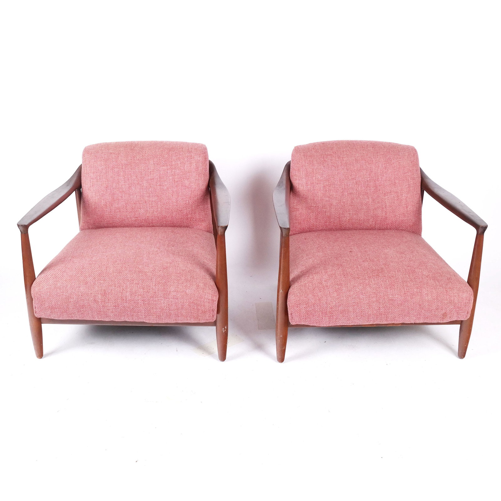 Pair of Mid-Century Walnut Arm Chairs: Pair of walnut arm chairs upholstered in red fabric, circa 1960. ]27" H x 29" W x 27" D]. In vintage condition.
