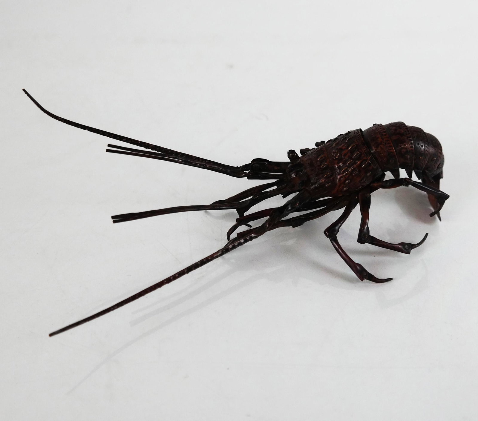 Japanese Meiji Articulated Crawfish Sculpture: Signed Japanese Meiji Period articulated copper crawfish sculpture. Provenance: Estate of Florence & Herbert Irving. [3" H x 6" W x 3" D]. In good condition.