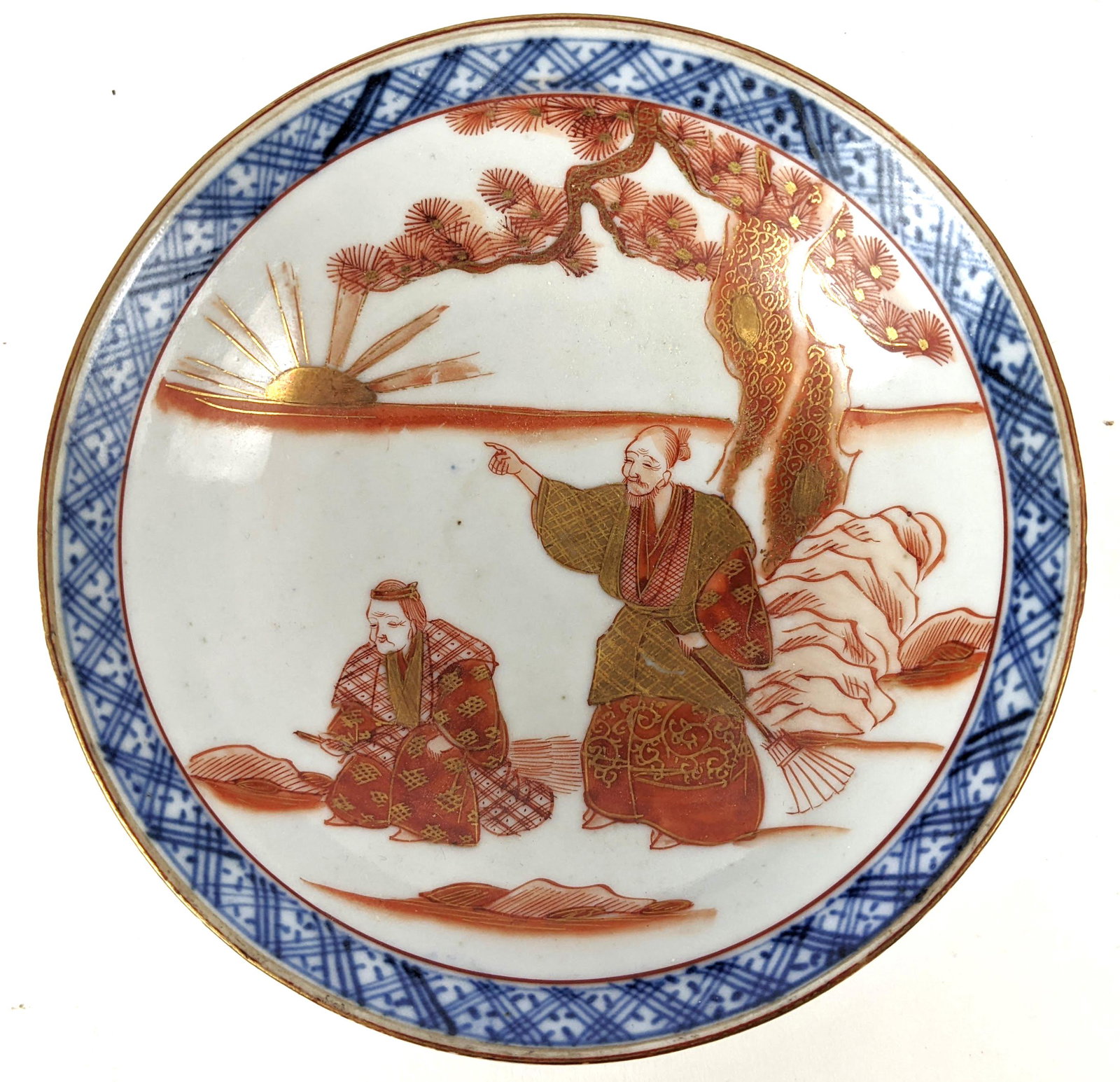 Japanese Kutani Bowl: Japanese Kutani bowl, depicting a Takasago pine tree, circa 1830. From the Estate of June Hirsch Jones. [1 1/2" H x 5 1/4" Diam.]. In good condition.