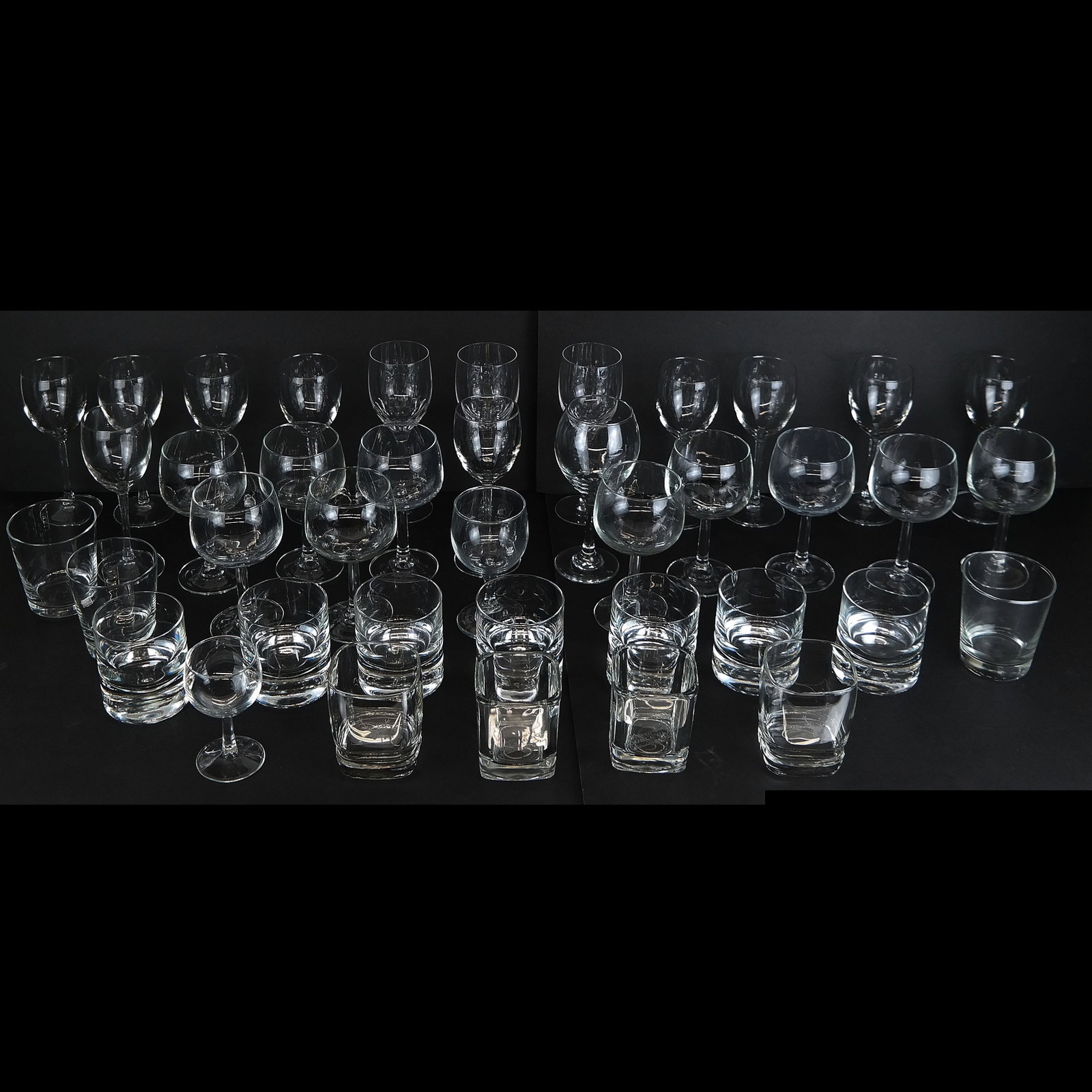 40 Pcs. Clear Glass Stemware & Tumblers: Miscellaneous group of clear glass stemware and tumblers, some having the molded word "France" on bottom, including 3 Baccarat wines and one Libbay small wine. Most pieces unmarked; all modern. [3 3/4