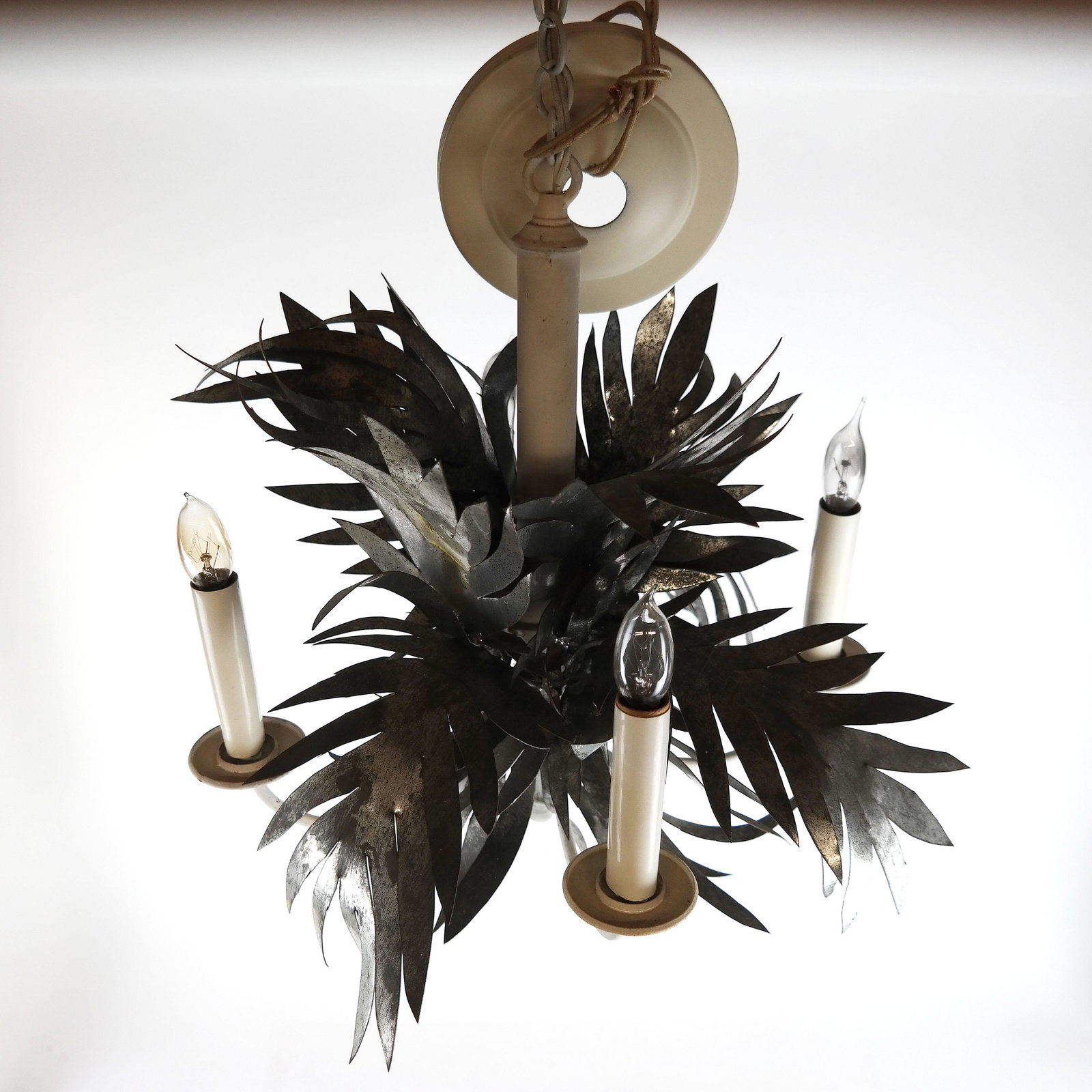 Unpainted Tole 4-Light Chandelier: Unpainted tole chandelier of palm frond design. [15" H x 13" Diam. plus chain].