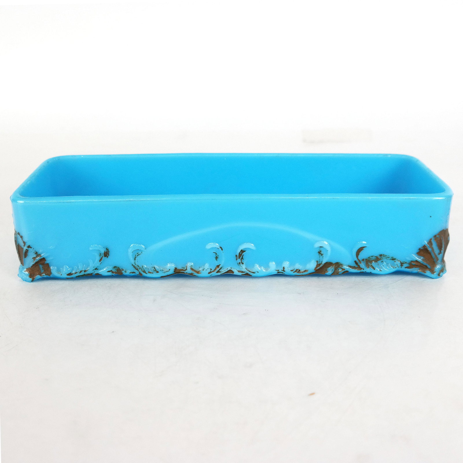 French Blue Opaline Long Tray: French blue opaline long tray, with high sides in box form, and gilt trim on impressions. [2 1/4" H x 10" W x 4" D].