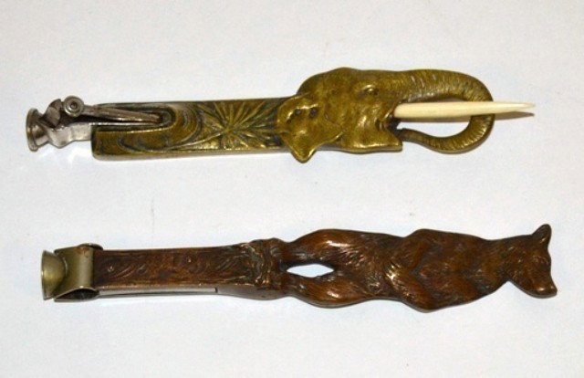 Tobacco: Two Cigar Cutters: Two Cigar Cutters: Elephant 1-1/4"W x 1"D x 6-3/4"H; Bear 1-1/4"W x 1/8" D x 6-1/2"H.