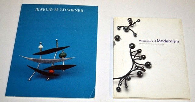 Two Books: "Jewelry by Ed Wiener" and "Messangers: Comprises "Jewelry by Ed Wiener," An Exhibition Catalogue from fifty/50 Gallery, December 1, 1988-January 7, 1989, 71 pages, 100+ illustrations, several in color. Together with an Exhibition Catalogue