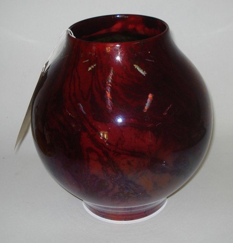 Zsolnay Sang de Beaouf Vase: Zsolnay irridescent mottled Sange de Beouf glazed Vase. Signed on bottom. Bears a small chip concealed under bottom edge.