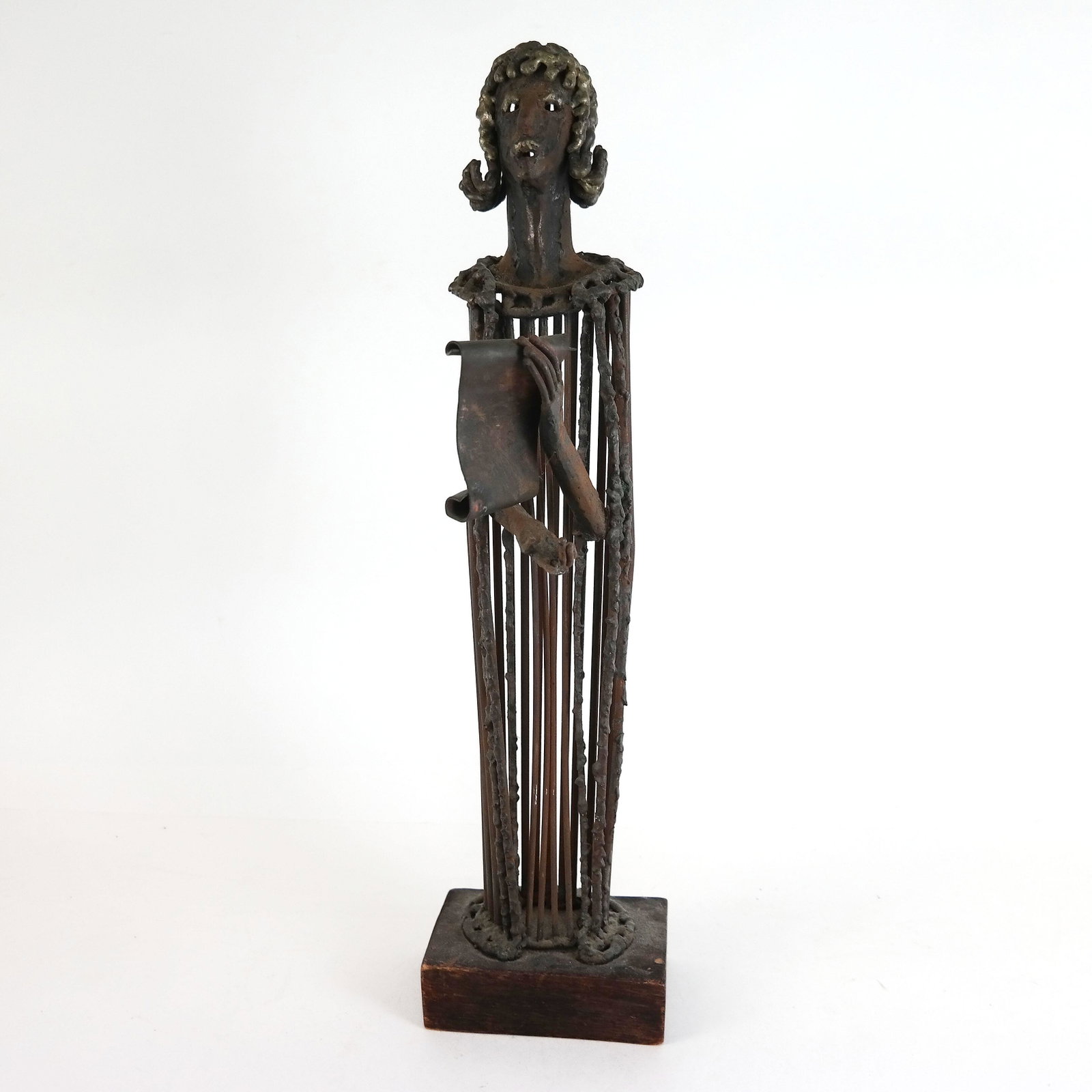 Dorothy ROBBINS: Figure - Bronze Sculpture: Dorothy Robbins (American, 1920-1999) bronze sculpture of a standing figure with scroll, signed to base reverse. [20 1/4" H]. Slight bending, oxidation, surface dust.
