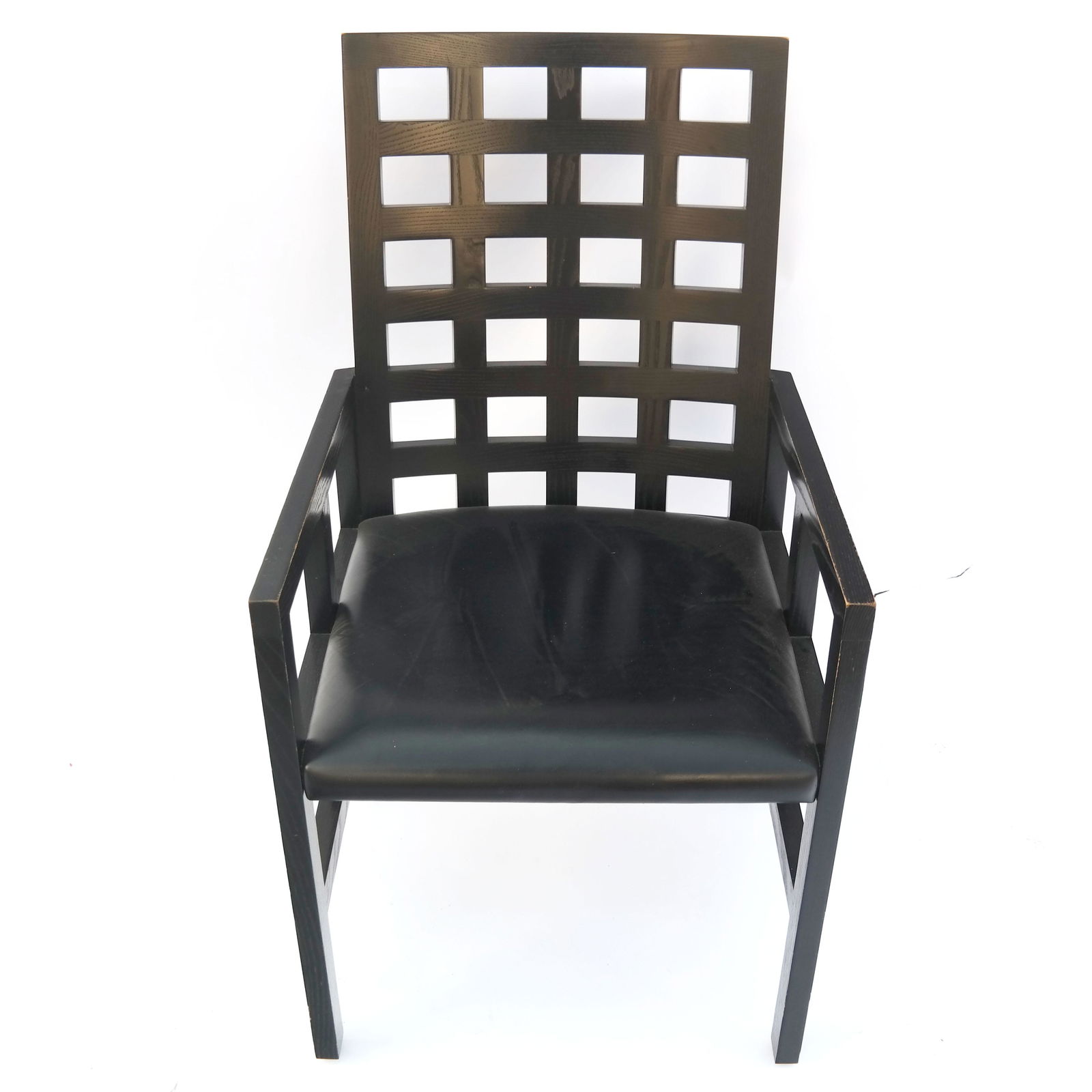 Modern Ebonized Ash Wood Armchair: Modern ebonized ash wood armchair, the underside with label "Ward Bennett Designs for Brickel Associates". [39" H x 21" W x 23" D]. Wear and rubbing.