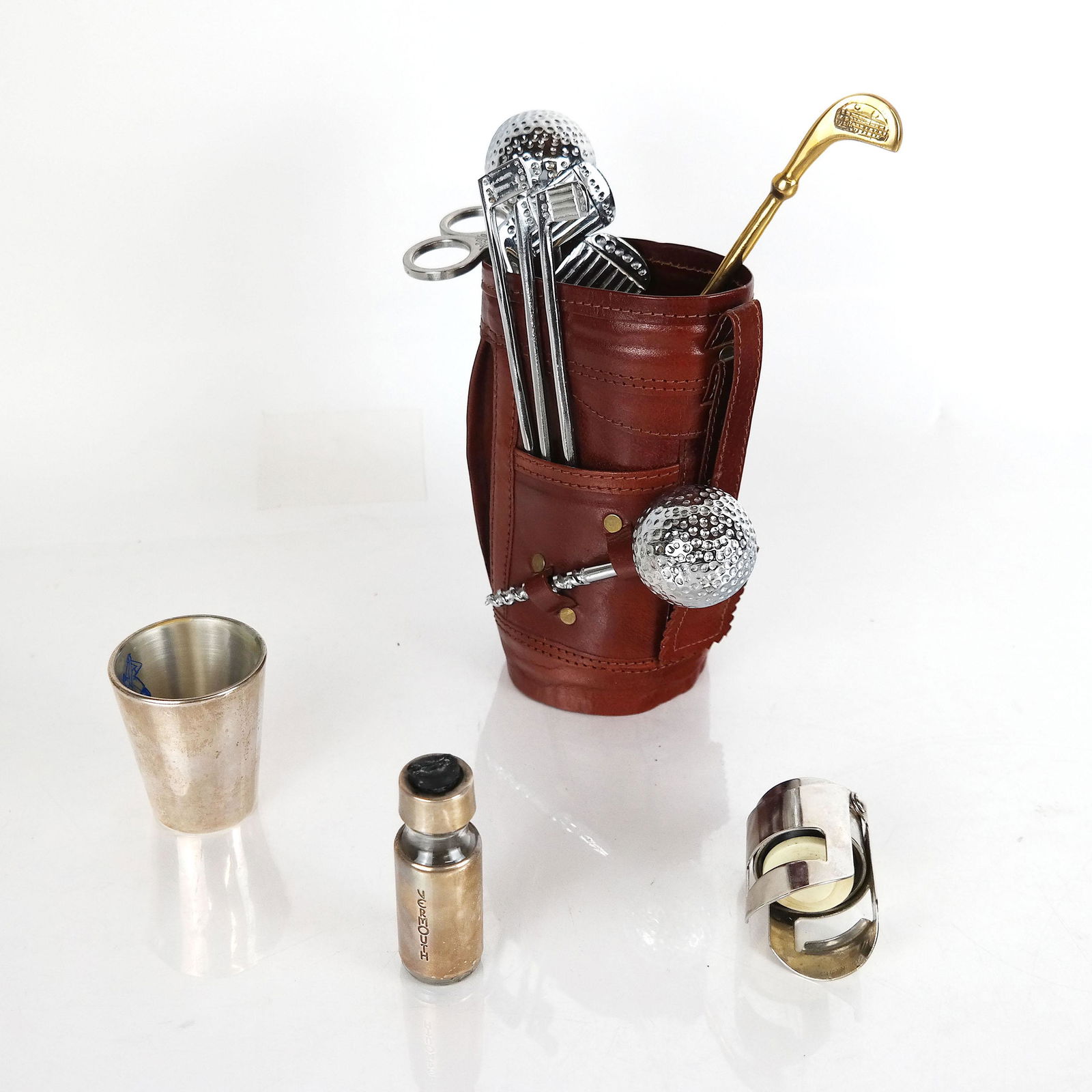 Golf Related Bar Tools: Golf related bar tools in leather golf bag. [7" H].