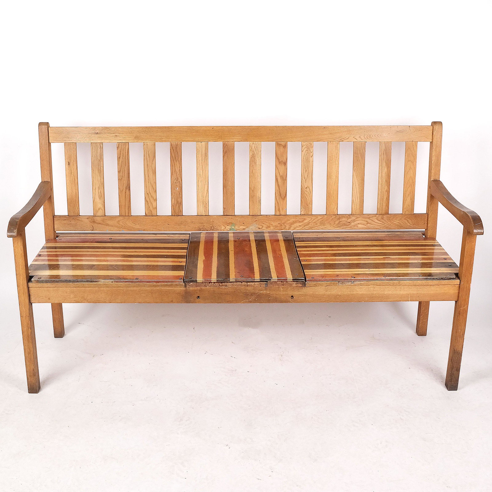 Mixed Wood Bench: Mixed wood bench. [34 1/2" H x 60" W x 21 3/4" D]. Seat possibly later replacement; overall with typical marks and wear.