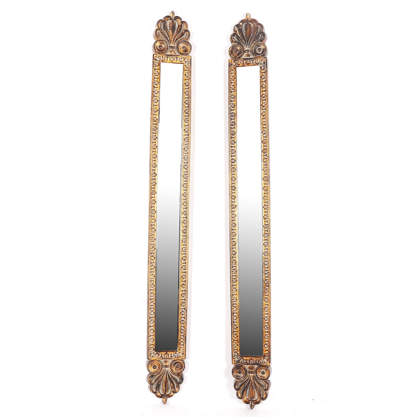 Pair of Neoclassical-Style Mirrors: Pair of Neoclassical-style mirrors with disc and palmette details. [60" H x 6" W]. Wear to decoration.