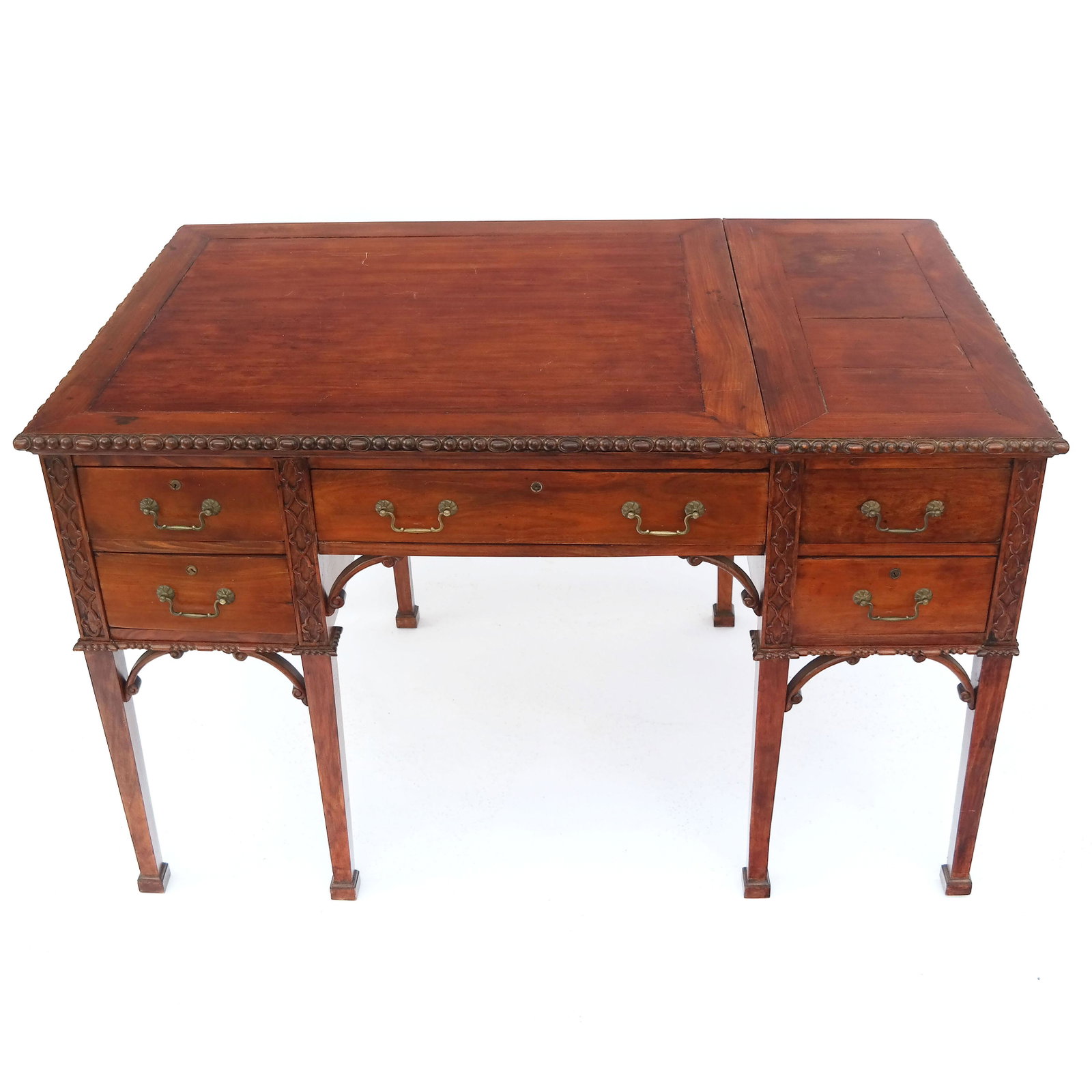 19th C. English Specialty Desk: 19th century Chippendale-style desk with ball trim and fretwork carved mahogany, having side hinge lock top, with divided interior, on straight legs. [31" H x 51" W x 30" D].