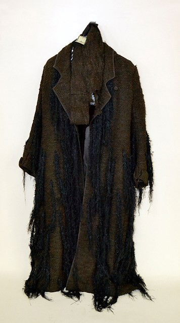 Fendi Coat: Fendi mink lined wool coat having the original price tag. Good condition.