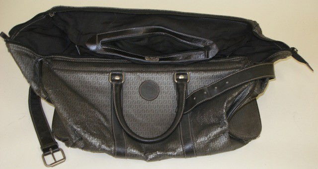 Fendi Travel Bag: In poor condition.