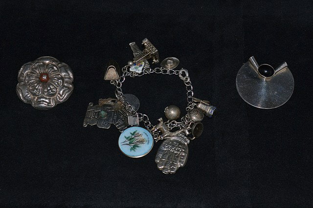 Sterling Silver Jane Ande and Pochoa Pendant: Signed, one with onex center. Mostly sterling silver.