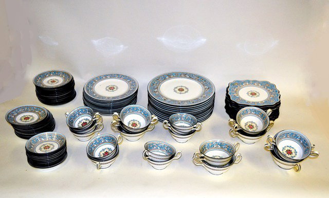 Wedgwood Dinner Service England 95 Pieces: Classical blue and white with floral center design including twelve dinner plates, twelve salad plates, twelve shaped sald plates, twelve cake plates, twelve underplates, twelve soup cups, eleven sauc